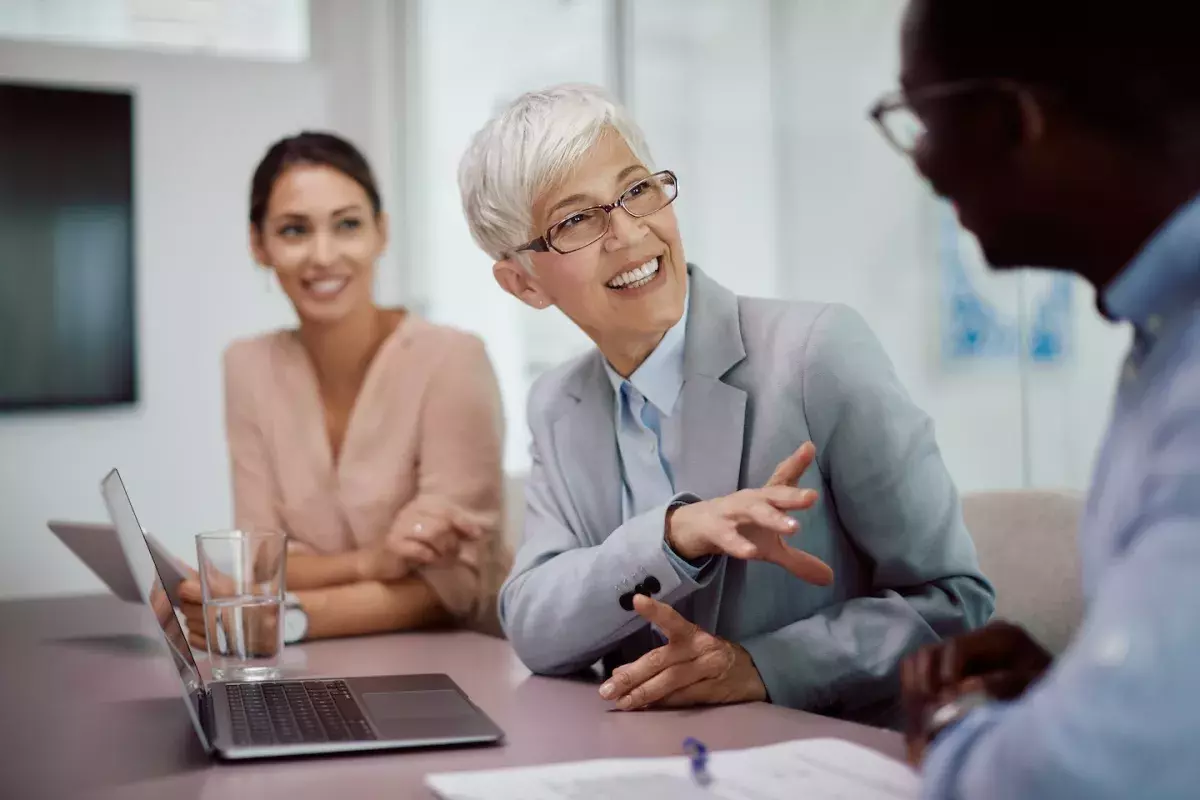 people talking in office people talking in office
