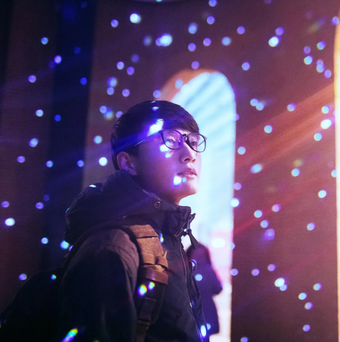 Light projected on man's face Light projected on man's face